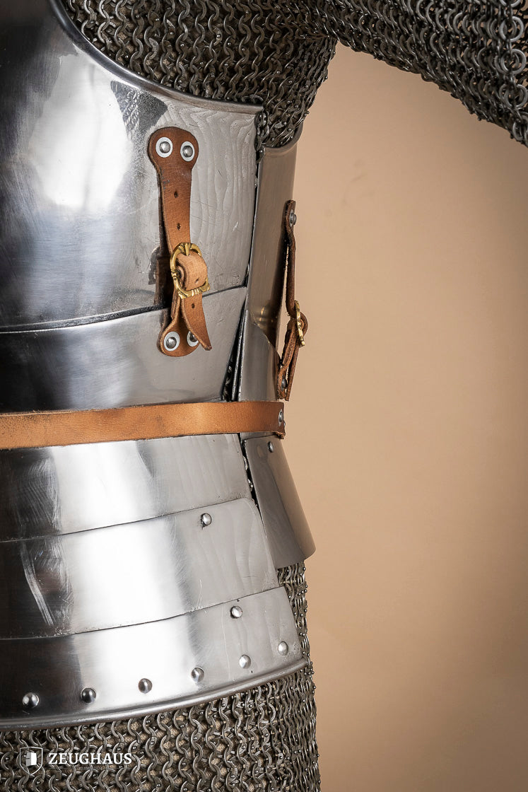 Polished Italian cuirass from the 14th century, made of 1.6 mm steel with leather straps, showcasing intricate craftsmanship.