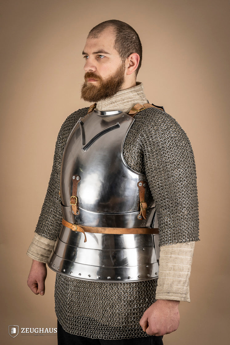 Polished Italian cuirass from the 14th century, made of 1.6 mm steel with leather straps, showcasing intricate craftsmanship.