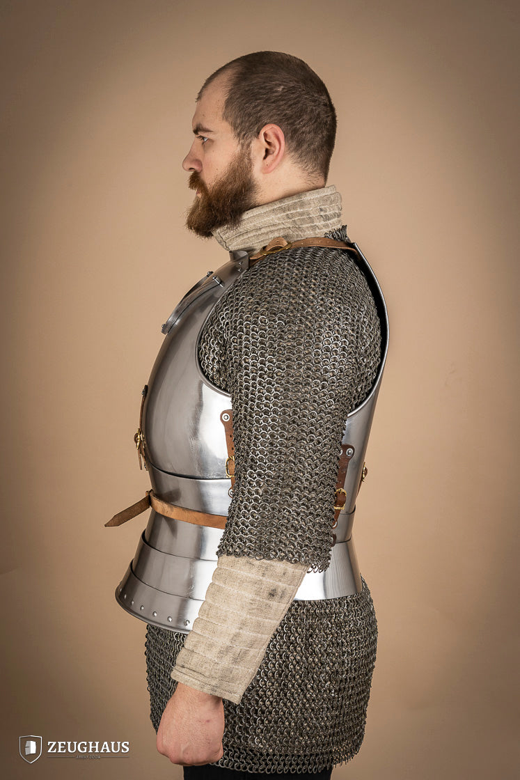 Polished Italian cuirass from the 14th century, made of 1.6 mm steel with leather straps, showcasing intricate craftsmanship.