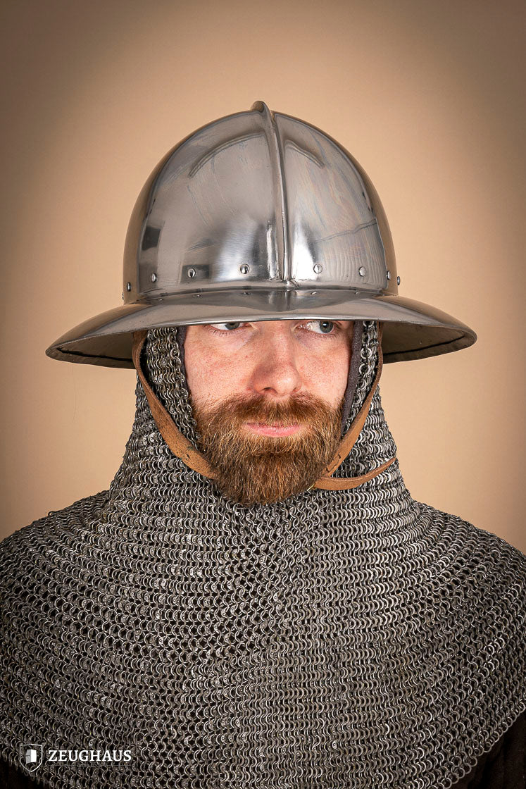 A polished 2 mm steel Kettle Hat Helmet, showcasing its medieval design and leather chin strap, suitable for historical reenactments.