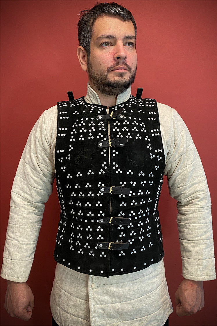 Leeds Brigantine Black armor made of steel and studded suede leather, featuring adjustable leather straps and multiple metal plates for protection and mobility.