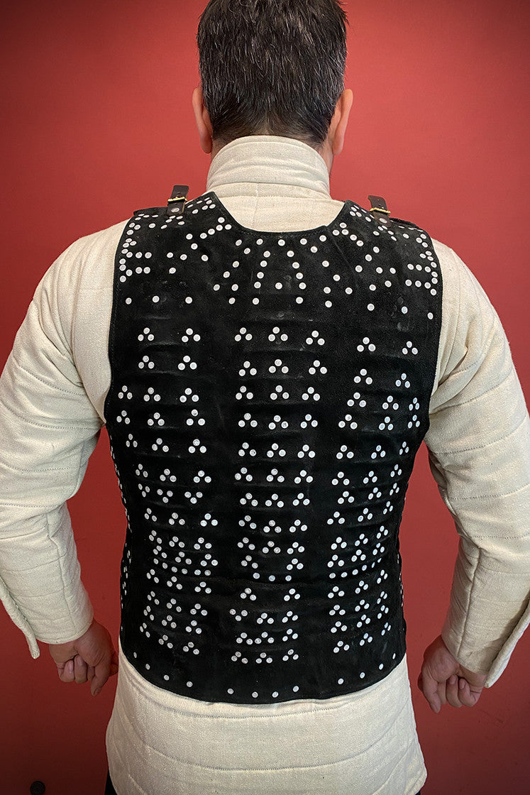 Leeds Brigantine Black armor made of steel and studded suede leather, featuring adjustable leather straps and multiple metal plates for protection and mobility.