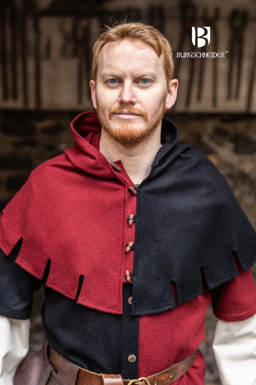 Left Side Cowl Dangereuse in black, featuring a close-fitting hood, rustic wooden buttons, and elegant crenelated pinnacles.