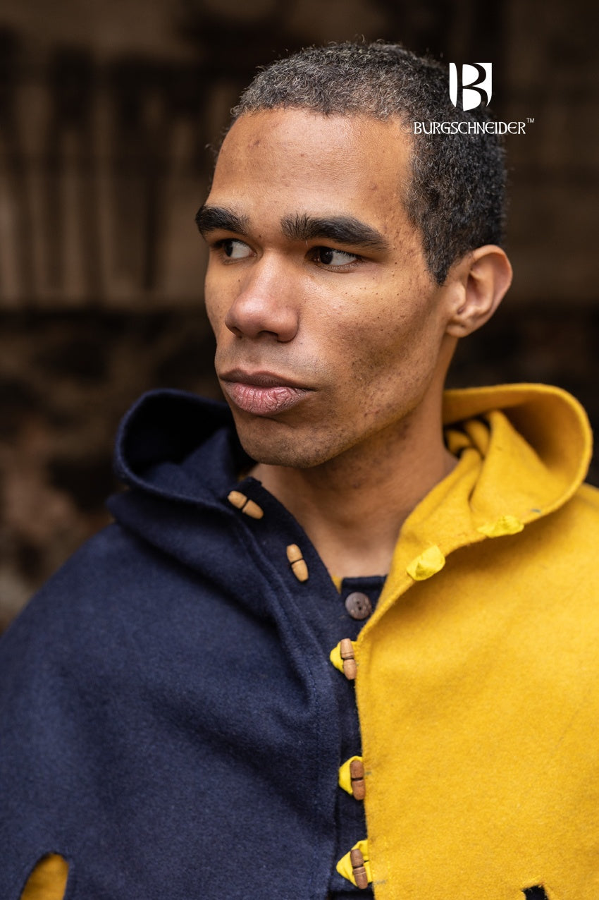 Left Side Cowl Dangereuse in vibrant yellow, featuring a close-fitting hood, rustic wooden buttons, and elegant crenelated design.