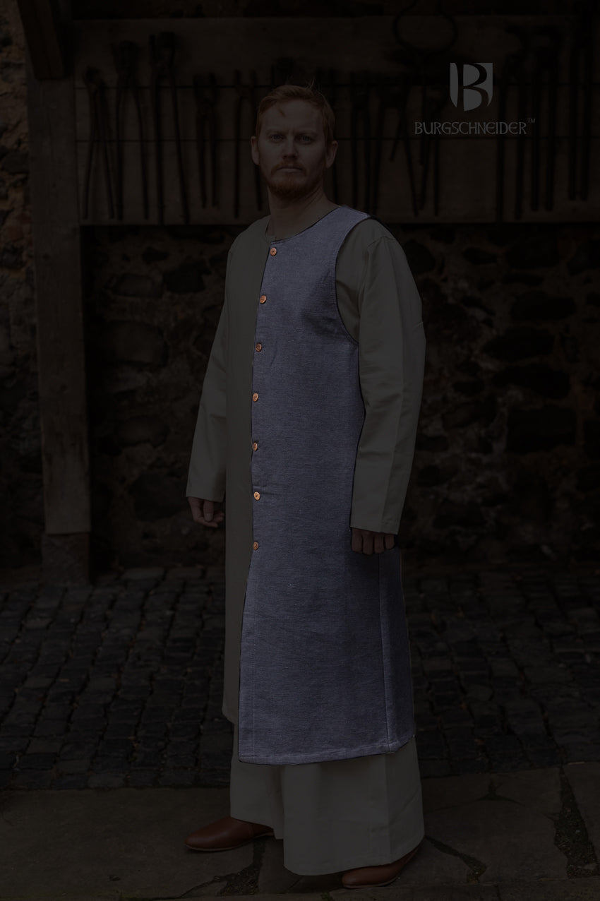 Left Side Tabard Auderic Black displayed on a mannequin, showcasing its elegant design and wooden button closure.