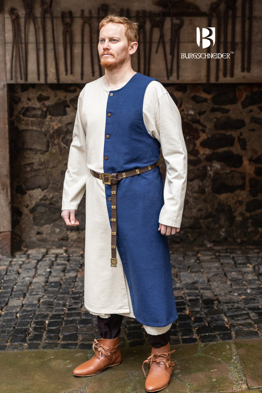 Left Side Tabard Auderic Blue featuring stylish wooden buttons and wide armholes, made from heavy cotton fabric.
