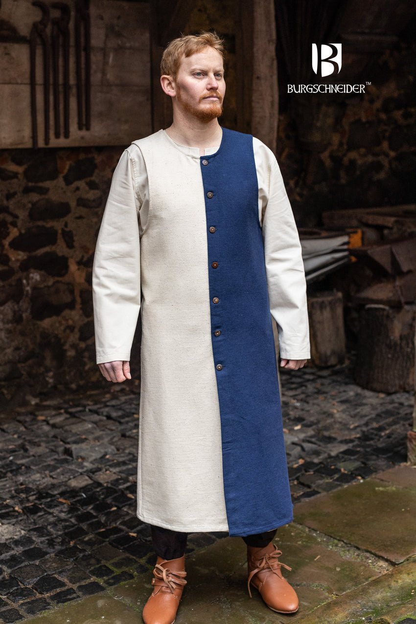 Left Side Tabard Auderic Blue featuring stylish wooden buttons and wide armholes, made from heavy cotton fabric.