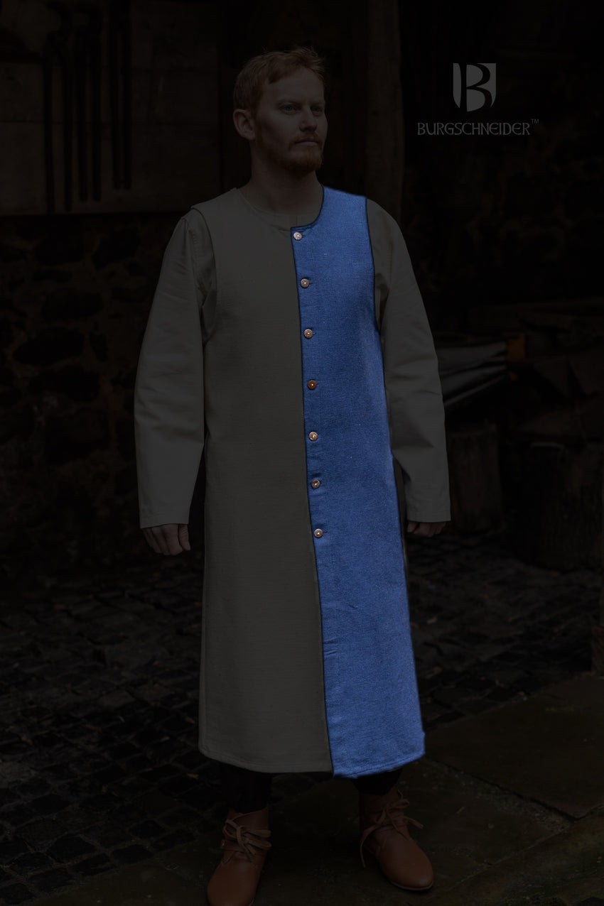 Left Side Tabard Auderic Blue featuring stylish wooden buttons and wide armholes, made from heavy cotton fabric.