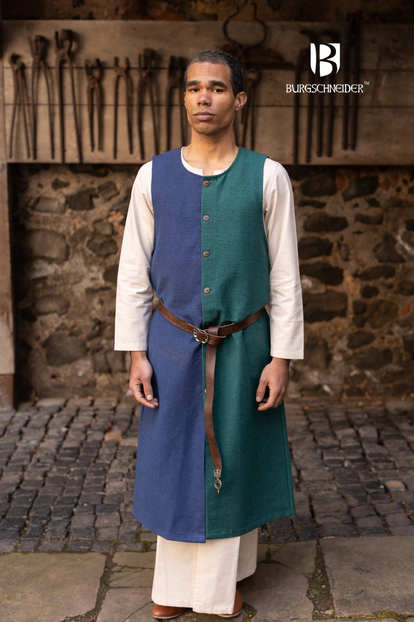 Left Side Tabard Auderic Green made from heavy cotton, featuring stylish wooden buttons and wide armholes for movement.
