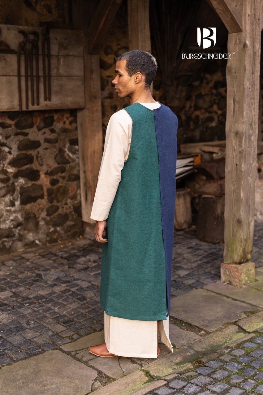 Left Side Tabard Auderic Green made from heavy cotton, featuring stylish wooden buttons and wide armholes for movement.