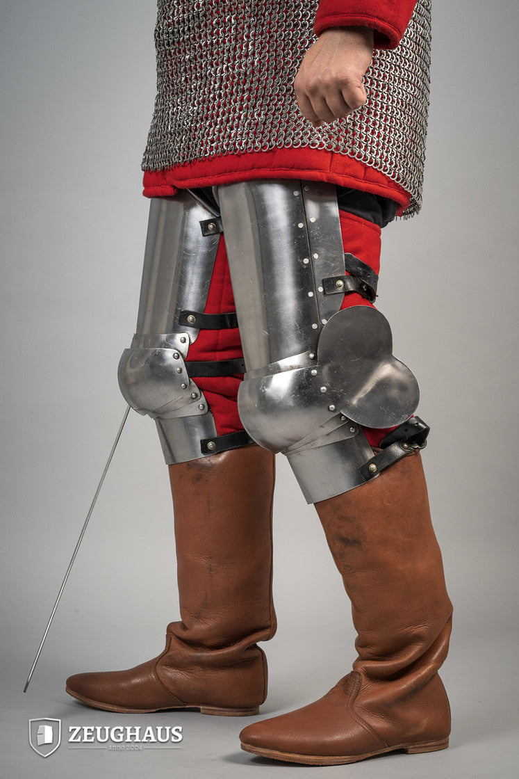 14th Century Leg Armour made of 1.6mm polished steel, featuring open back design and leather straps for secure fit.