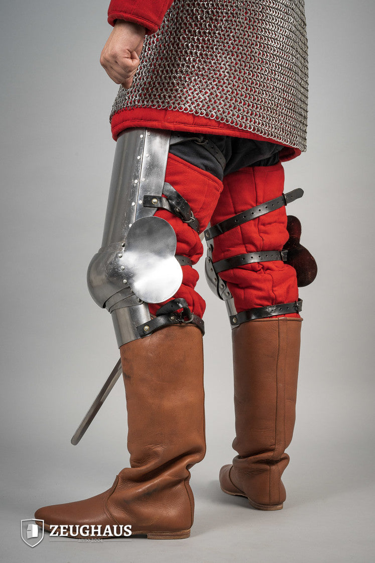 14th Century Leg Armour made of 1.6mm polished steel, featuring open back design and leather straps for secure fit.