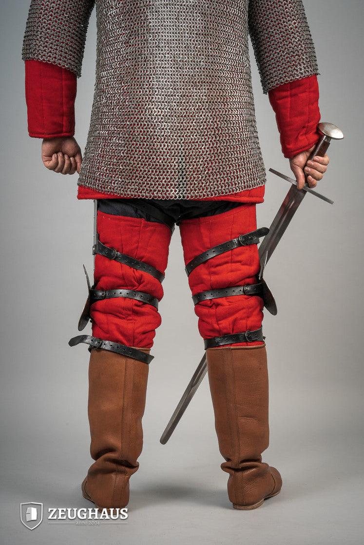14th Century Leg Armour made of 1.6mm polished steel, featuring open back design and leather straps for secure fit.