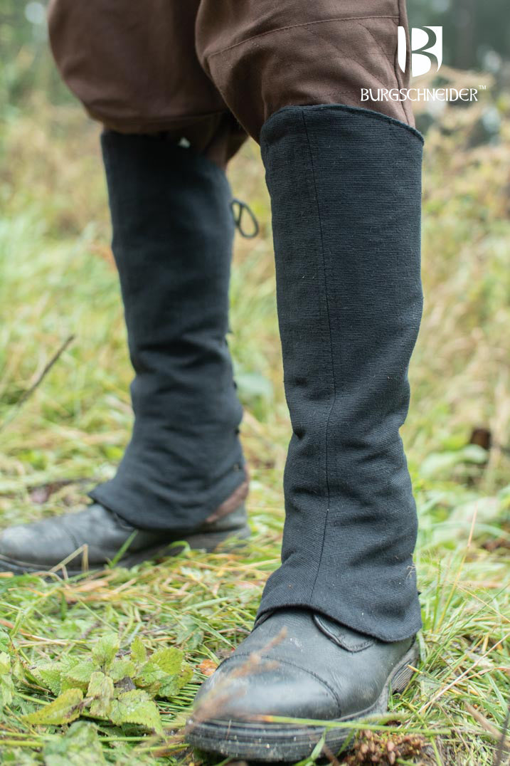 Black Nares Leg Cuffs made from 100% cotton, featuring lacing at the back for flexibility, ideal for rogues and hunters.
