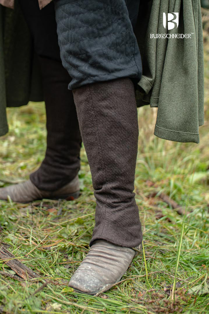 Seran Brown Leg Cuffs made from a warm wool blend, featuring adjustable lacing at the back for a flexible fit.