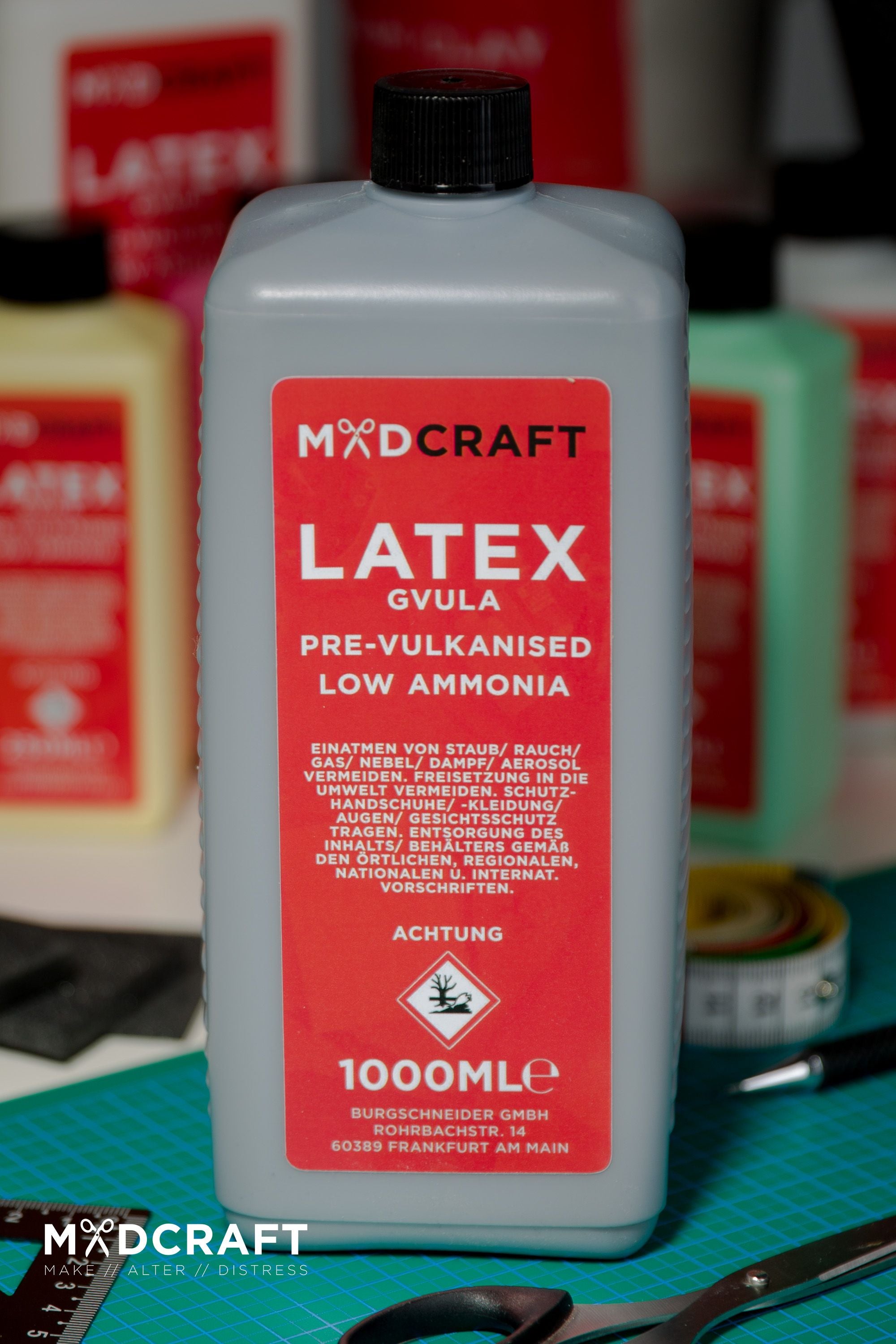 A 1-liter container of Liquid Latex Black, showcasing its sleek design and dark color, ideal for crafting LARP weapons and shields.