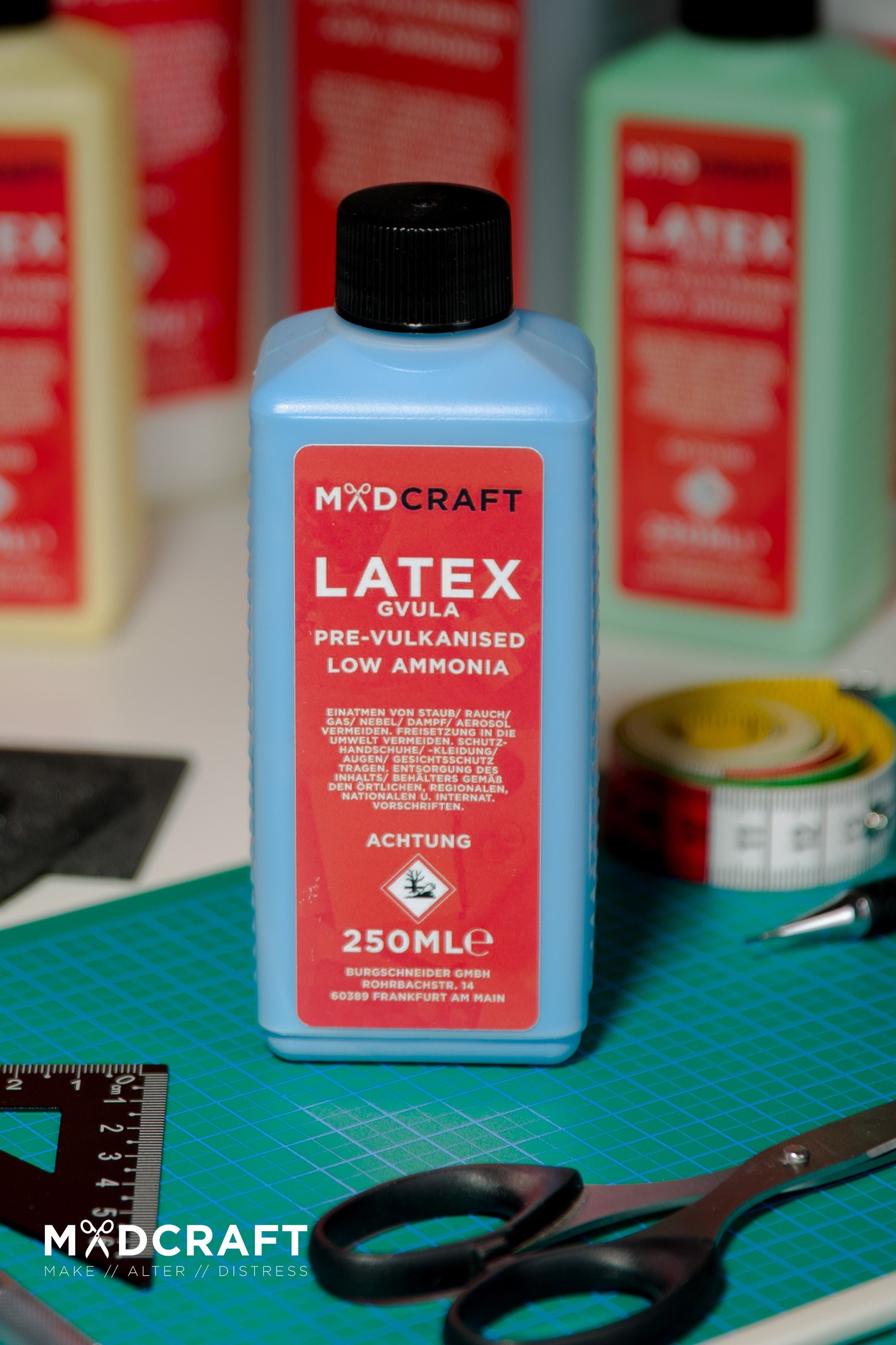 250ml bottle of Liquid Latex Blue, ideal for LARP weapons and shields, showcasing its vibrant blue color and durable packaging.