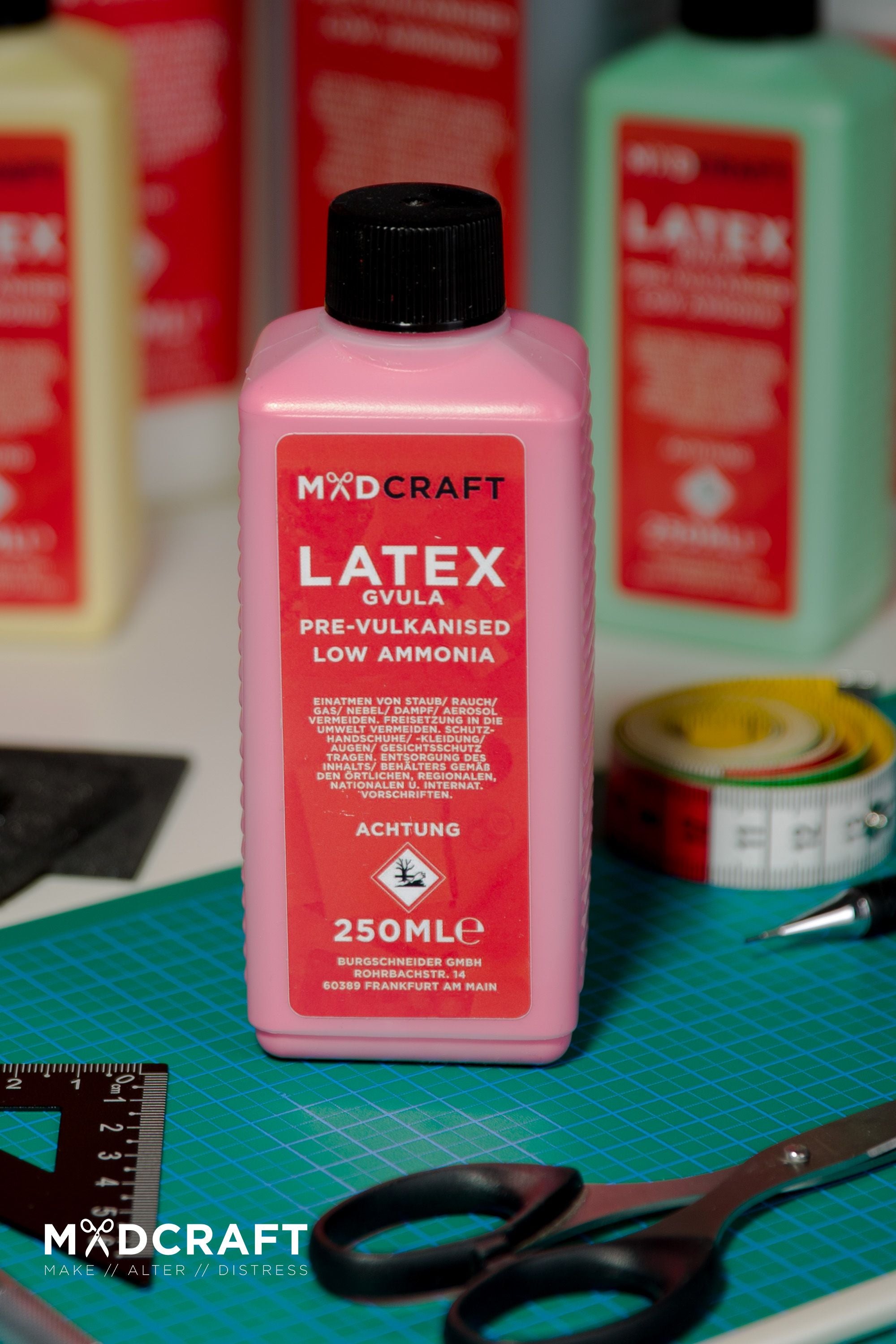 250ml bottle of Liquid Latex Red, showcasing its vibrant color and packaging, ideal for crafting LARP weapons and shields.