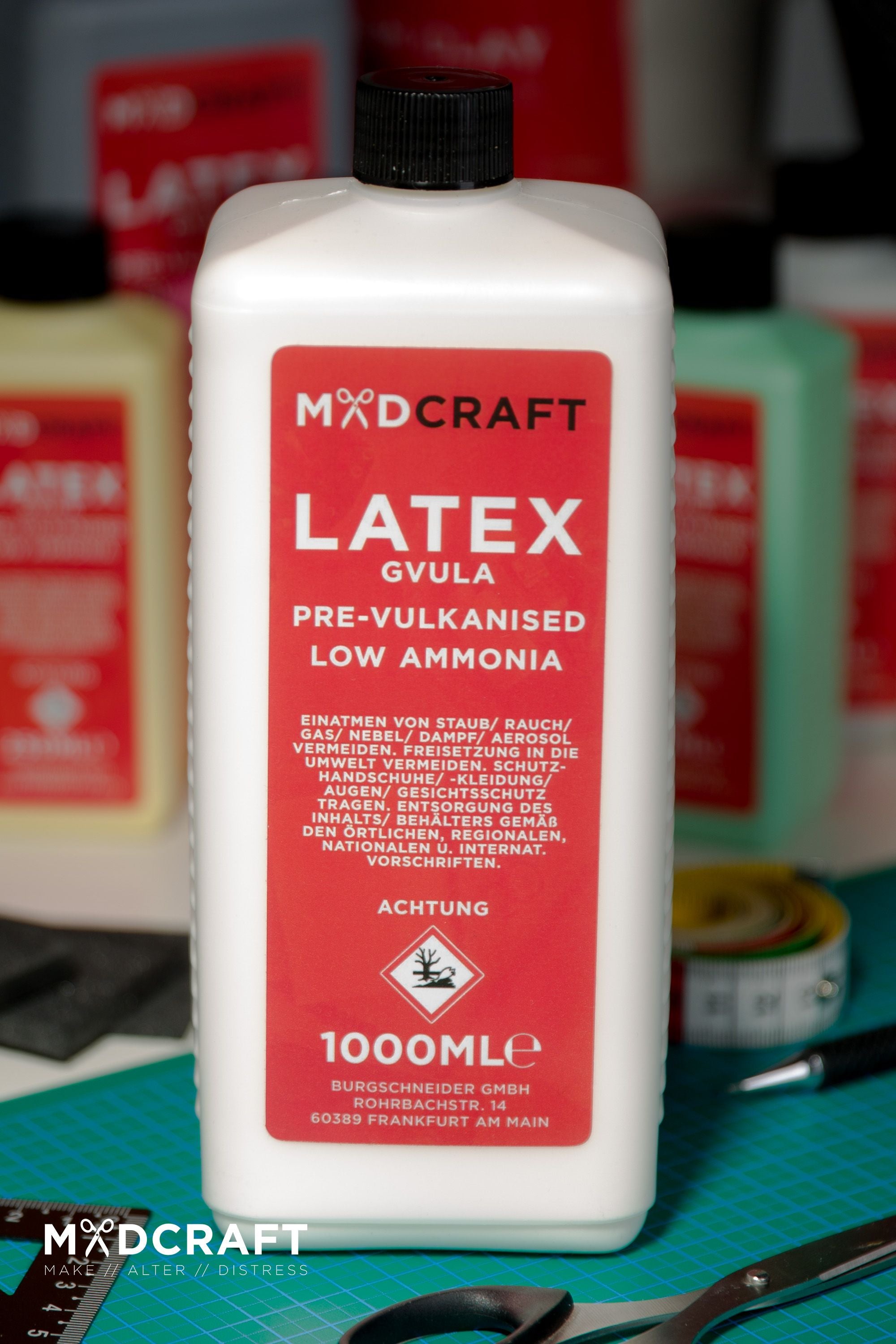 A 1-liter container of Liquid Latex White, showcasing its smooth texture and ideal for crafting LARP weapons and shields.