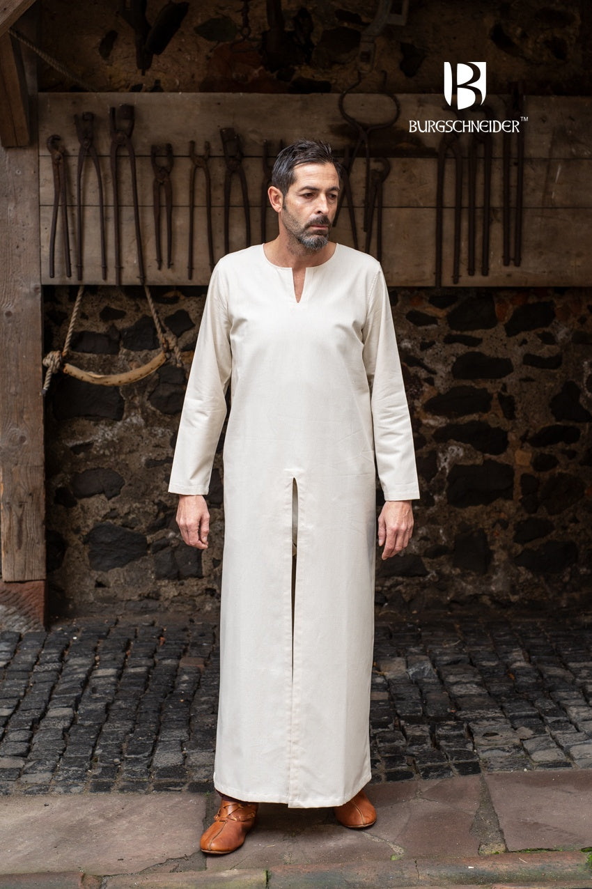 Bernard Long Under Tunic in Natural color, made from breathable cotton, featuring front and back slits for movement.