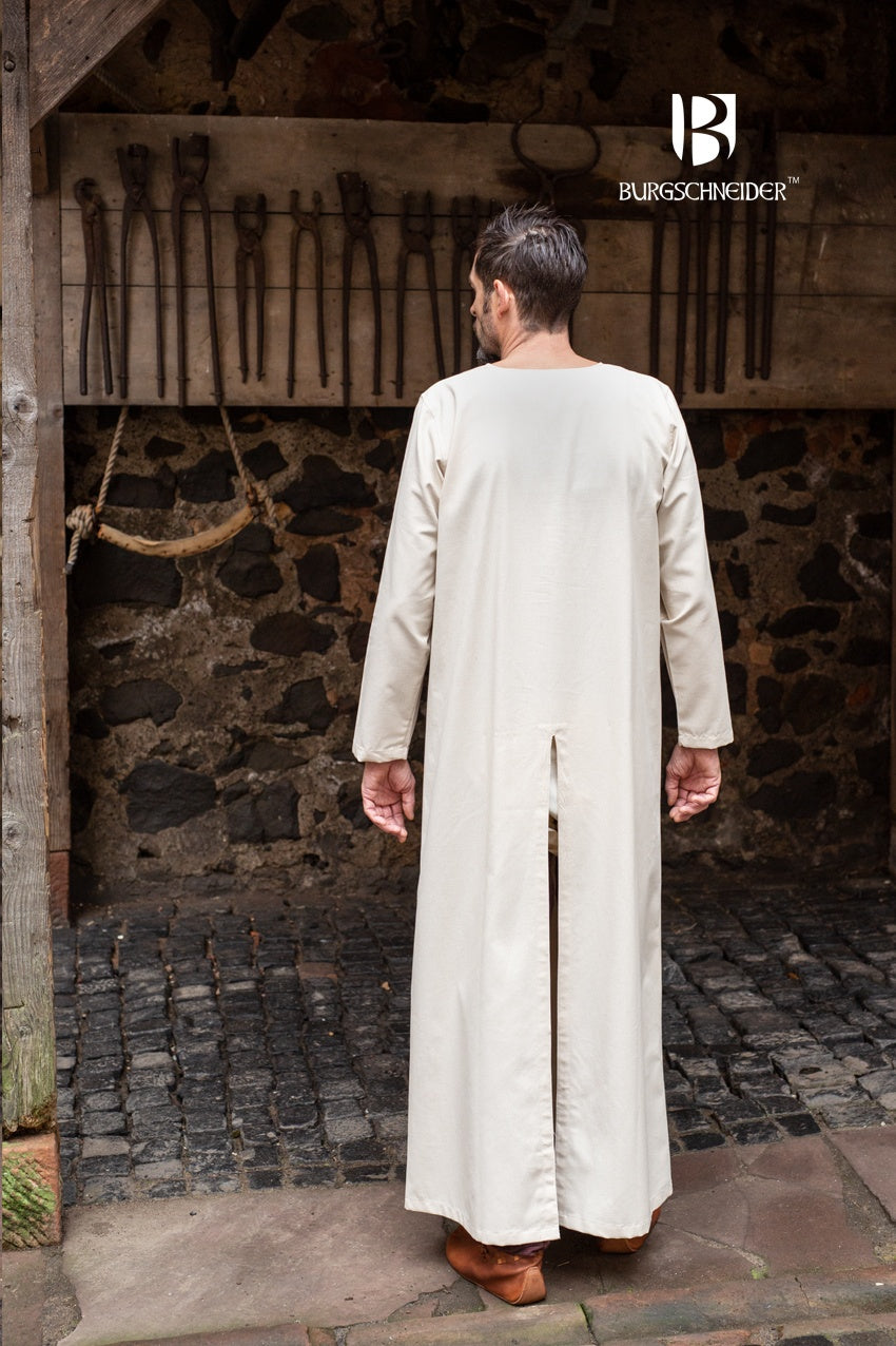 Bernard Long Under Tunic in Natural color, made from breathable cotton, featuring front and back slits for movement.