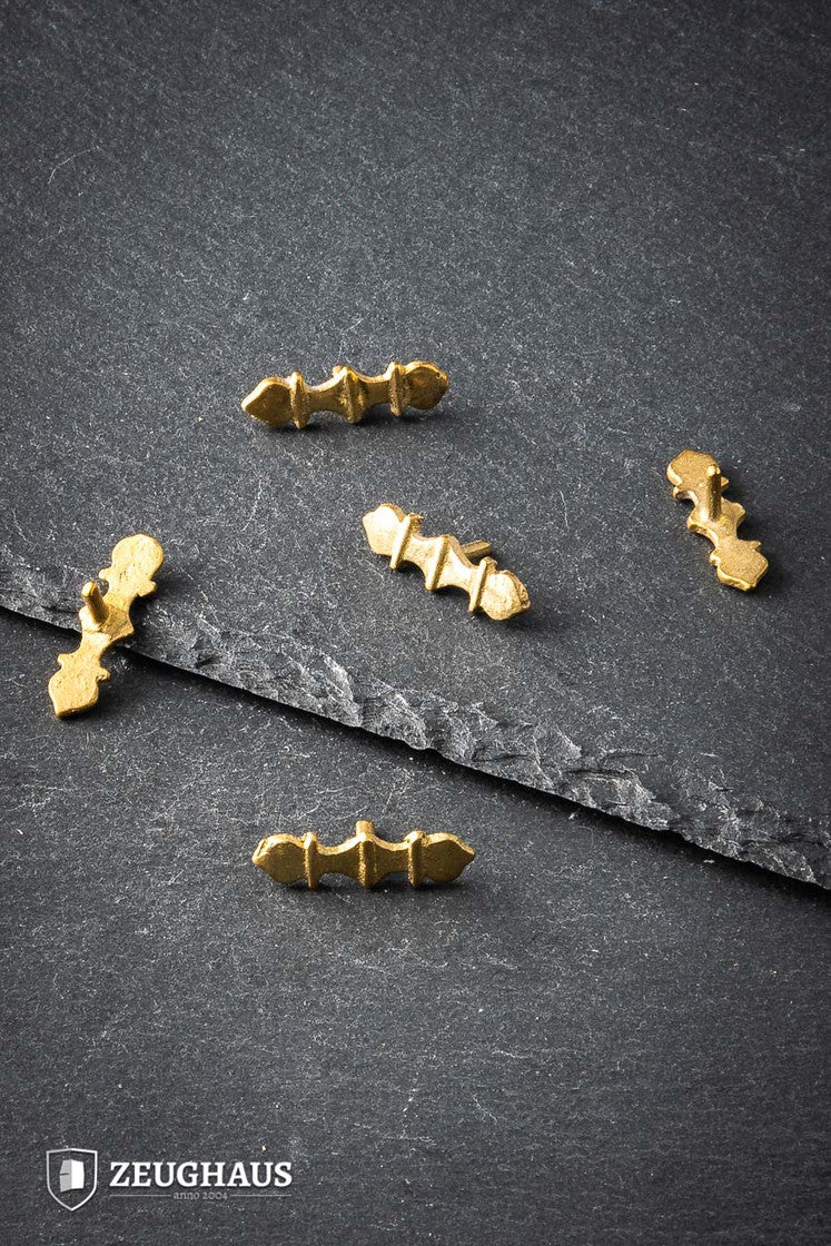 Set of five brass Medieval Belt Mounts showcasing intricate designs, perfect for enhancing historical costumes.