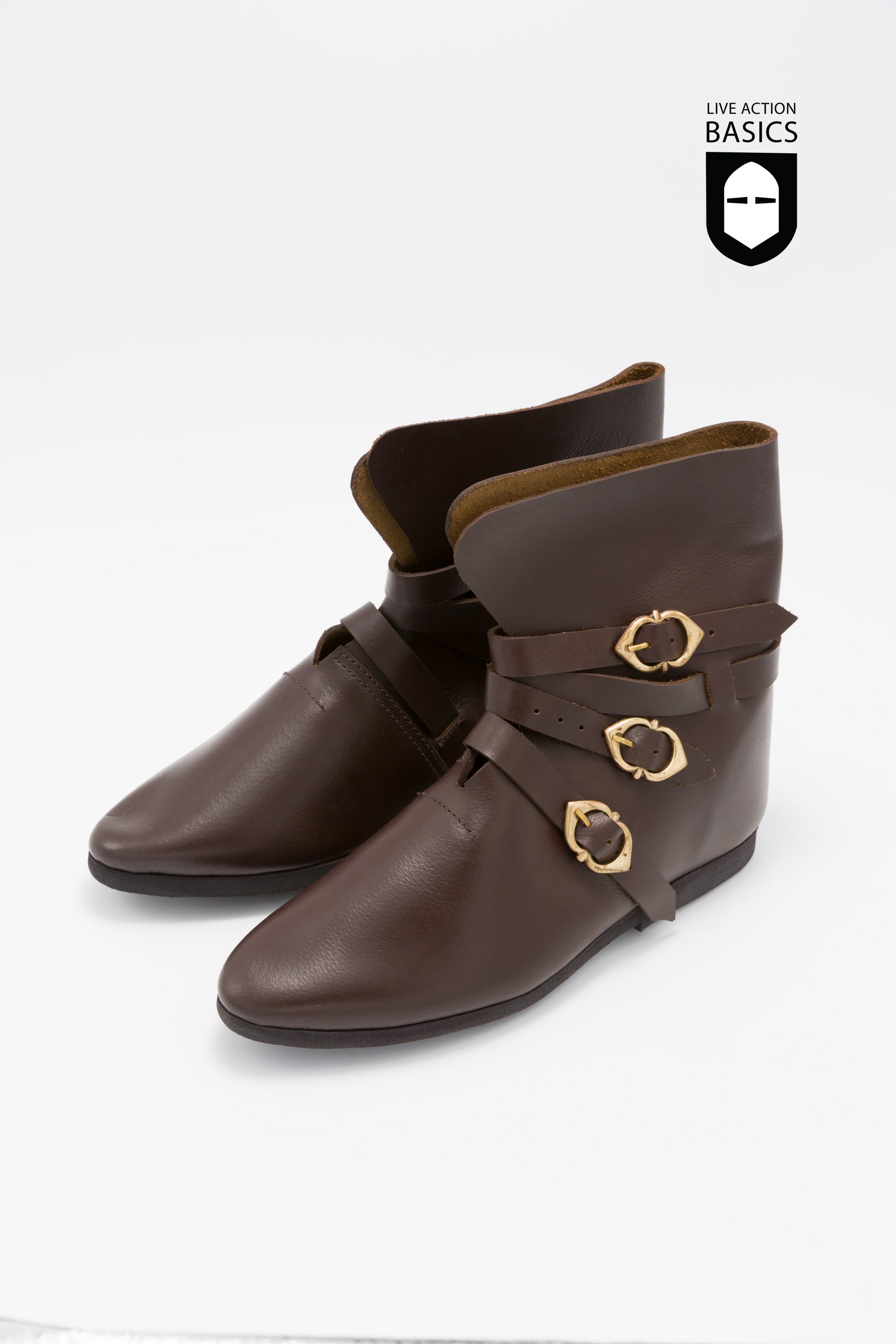 A pair of dark brown medieval half boots featuring three stylish buckles and a versatile shaft design.