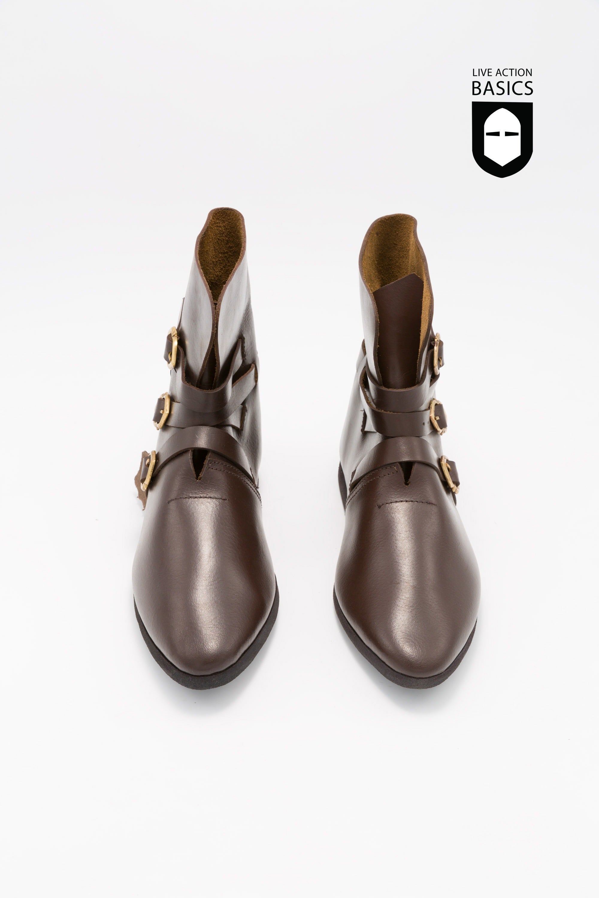 A pair of dark brown medieval half boots featuring three stylish buckles and a versatile shaft design.