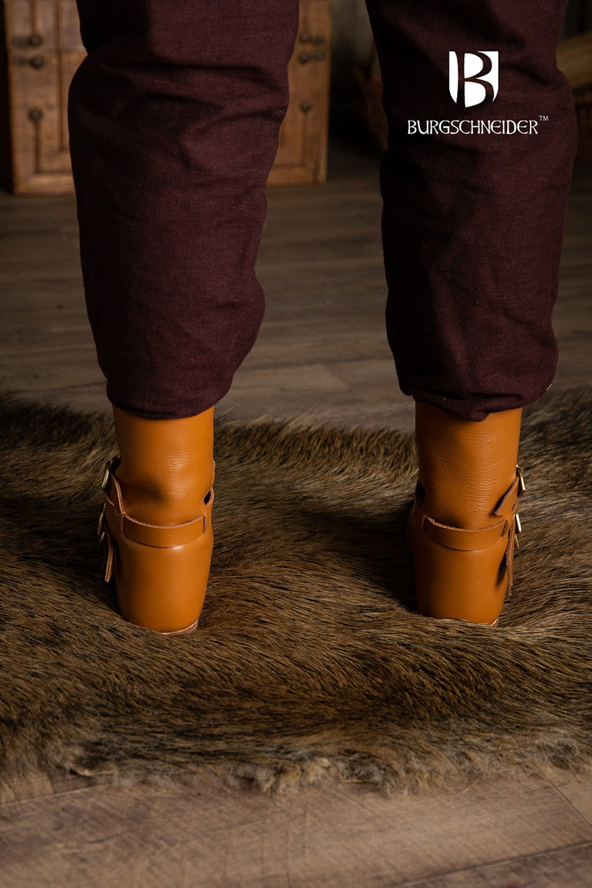 Brown medieval half boots with three stylish buckles and adjustable shaft for a customizable look.