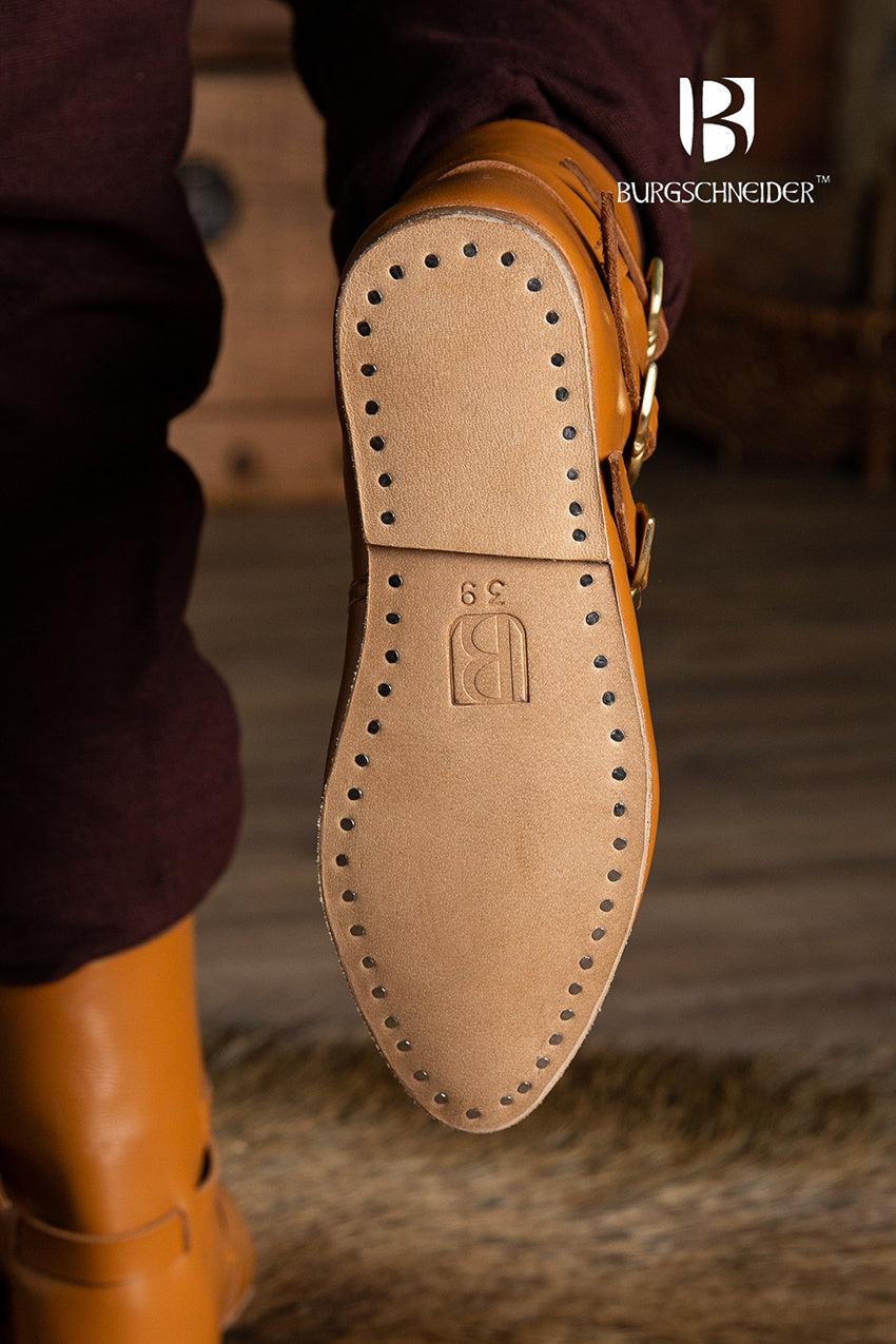 Brown medieval half boots with three stylish buckles and adjustable shaft for a customizable look.