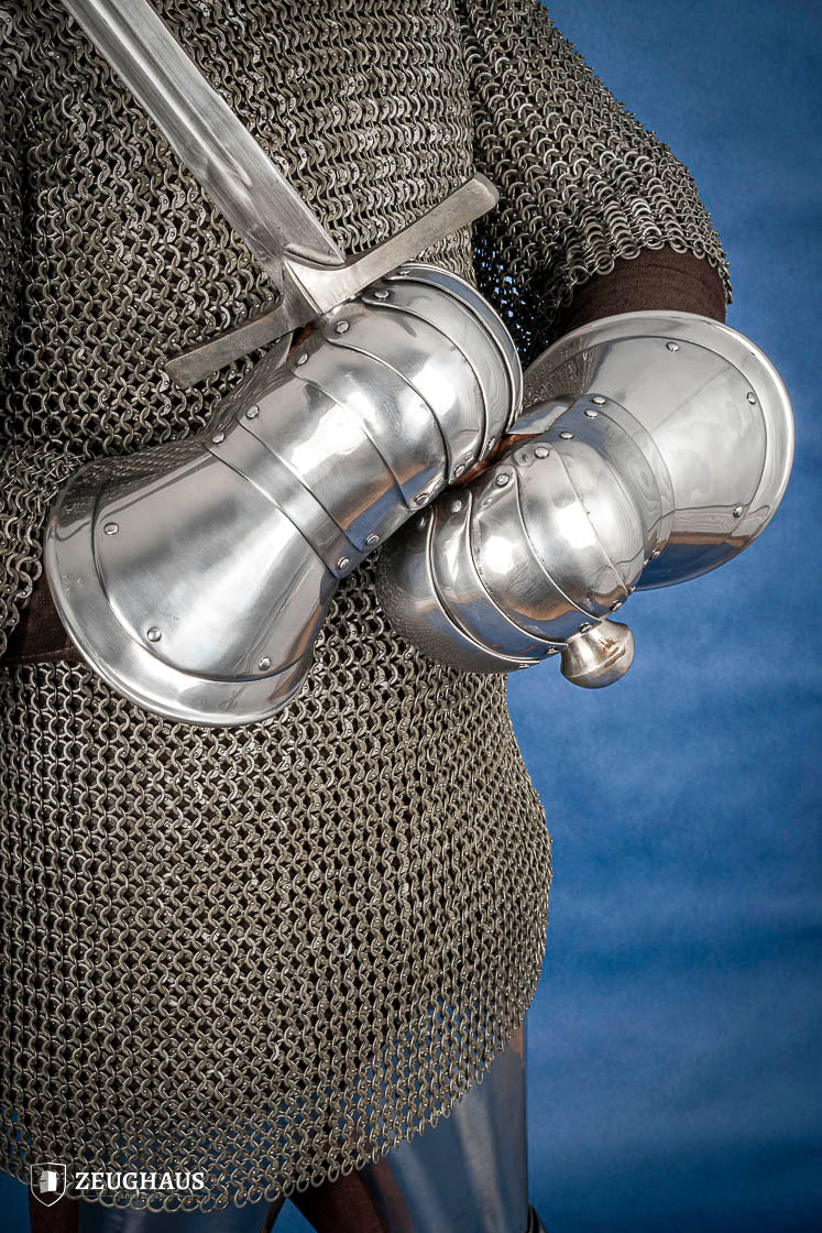 15th Century Mitten Gauntlets made of 1.2 mm steel, featuring a leather strap for secure fit and layered construction for protection.