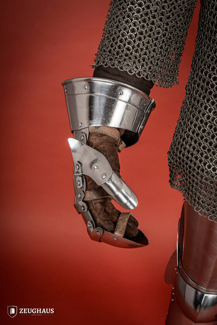 Polished 1.6mm steel Mitten Gauntlets with leather straps, showcasing elegant craftsmanship and layered construction.