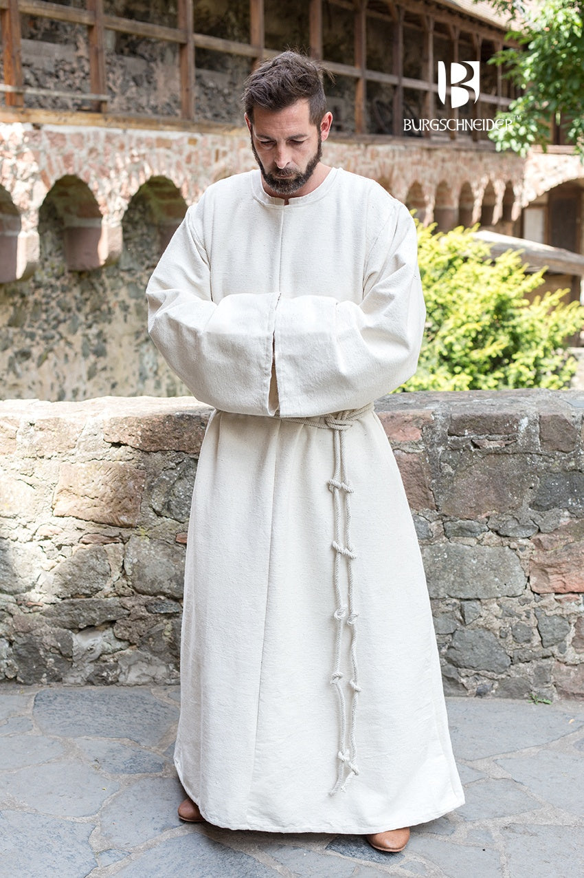 Monk's Habit Benediktus Natural robe in natural white with a gugel and knit belt, showcasing its medieval-inspired design.
