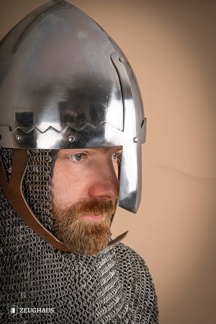 St. Wenceslaus Nasal Helmet made of polished 2mm steel with a padded inner lining and adjustable leather chinstrap.