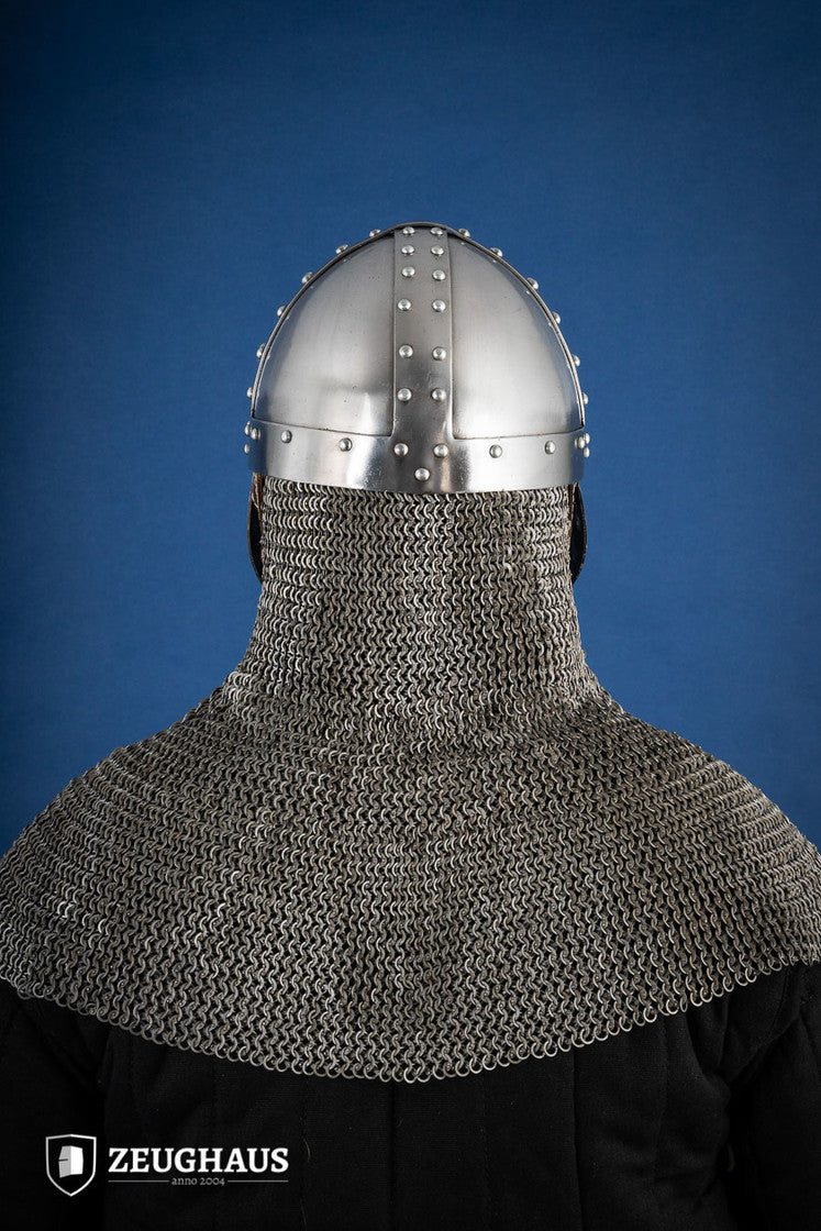 Norman Faceplate Spangenhelm with polished finish and chin-strap, showcasing medieval design and slits for breathability.