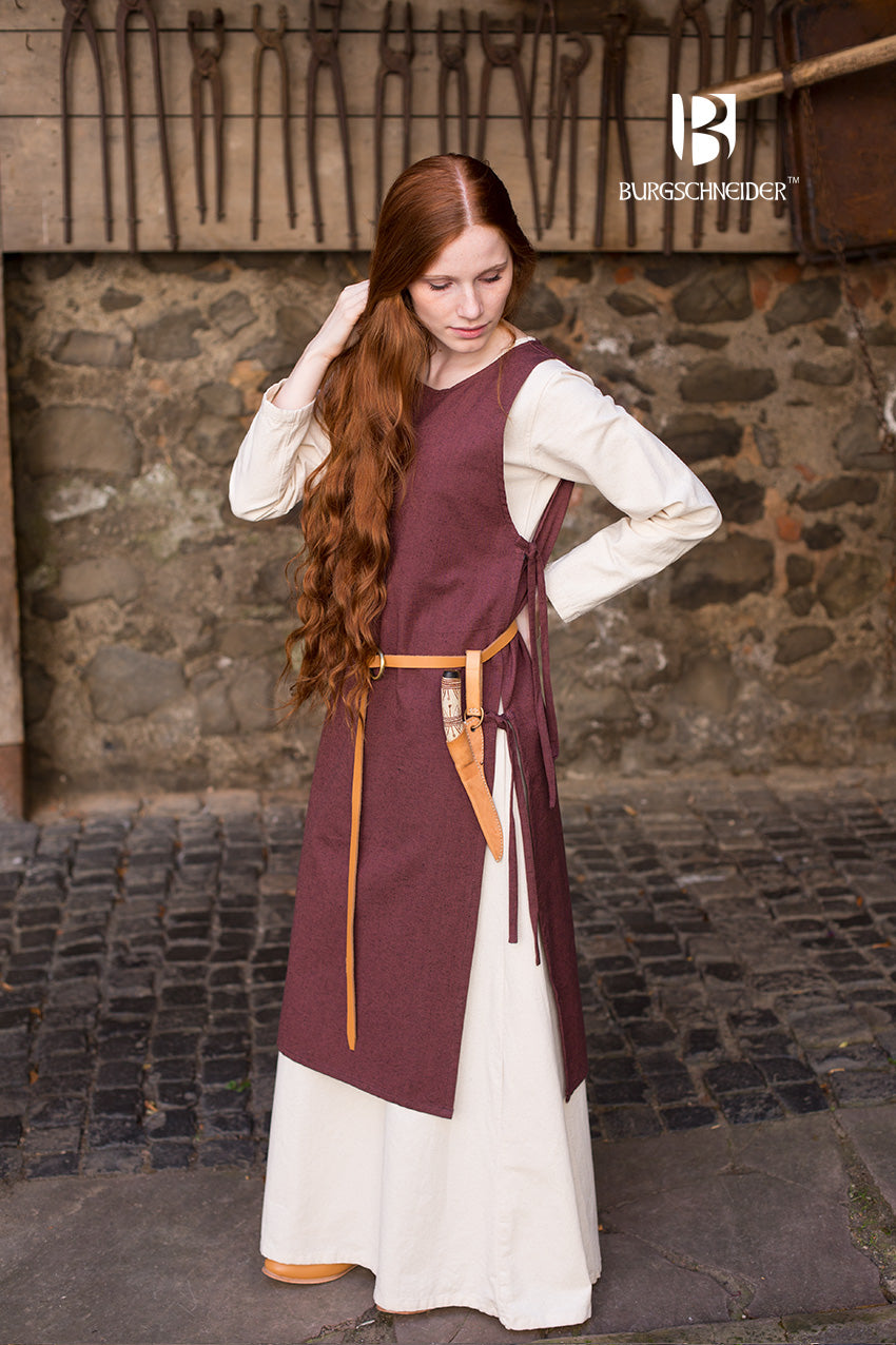 Over Dress Haithabu Brown, a Viking-inspired women's dress made from coarse woven cotton with side lacing for flexibility and comfort.