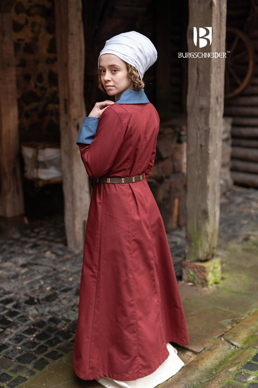 The Loretta Over Dress in Bordeaux and Woad Blue featuring a flared bottom, cuffed sleeves, and a stylish lapel neckline.