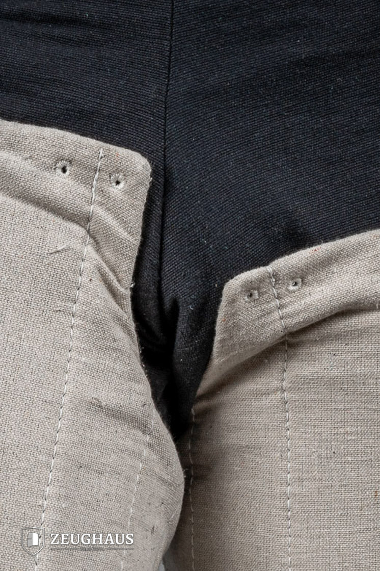 Padded Chausses Natural made from premium cotton, showcasing their historical design and padded features.