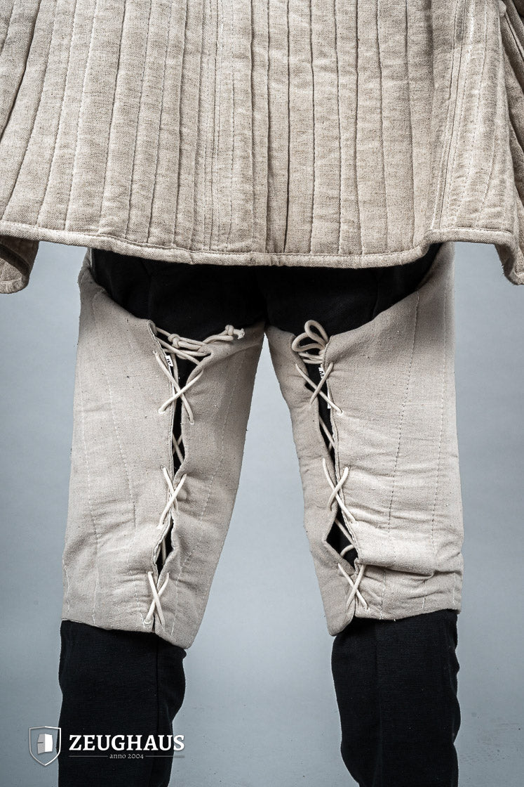 Padded Chausses Natural made from premium cotton, showcasing their historical design and padded features.