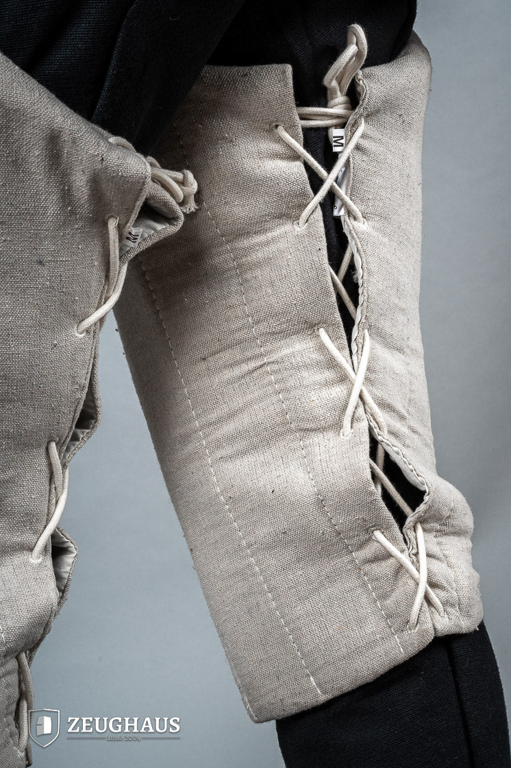 Padded Chausses Natural made from premium cotton, showcasing their historical design and padded features.