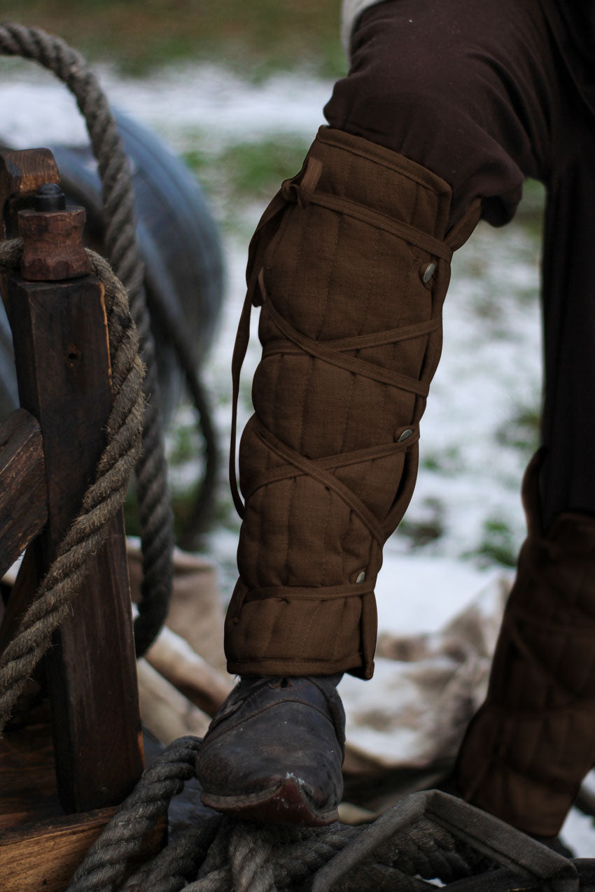 Padded Legs Eisenbrück Brown featuring adjustable straps and chic cross-wrapped lacing design, ideal for LARP activities.