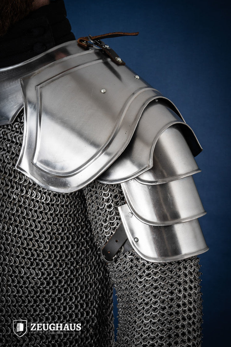 Polished Warrior Pauldrons made from genuine leather, featuring a four-part upper arm thrust design for protection and mobility.