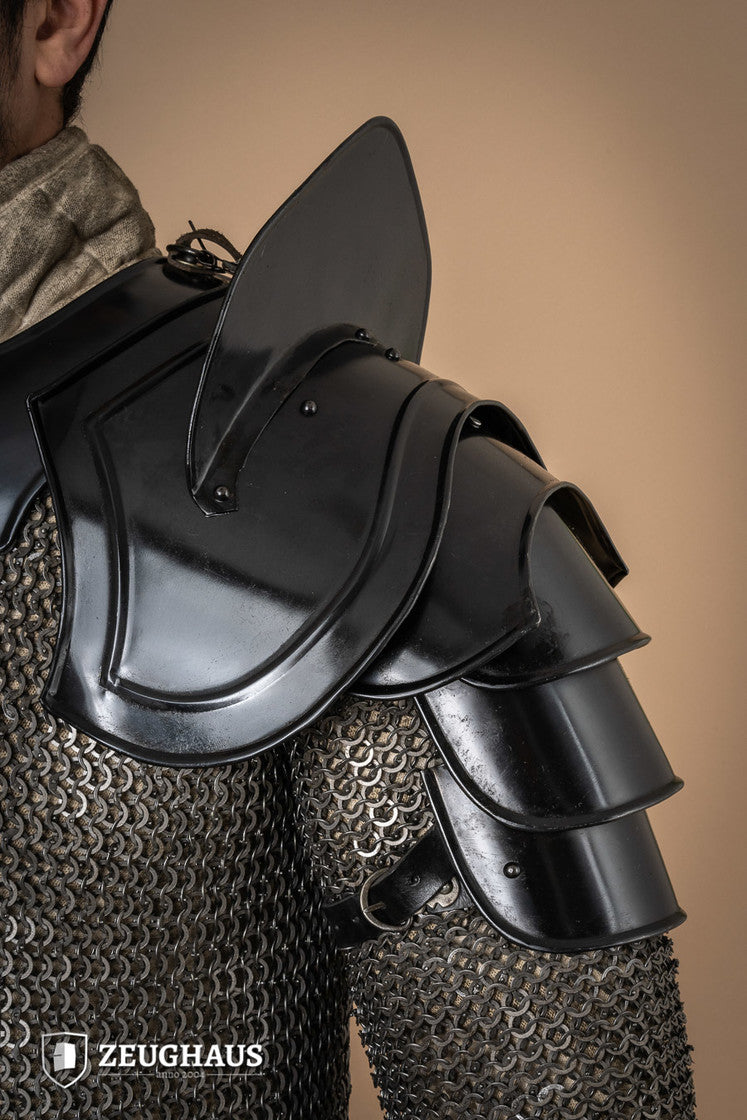 Burnished Warrior Pauldrons with Bladebreakers showcasing four-part upper arm plates and adjustable leather straps.