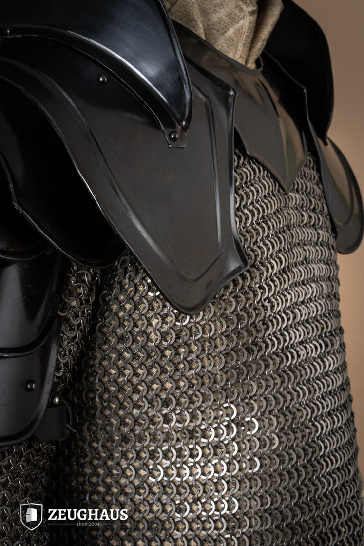 Burnished Warrior Pauldrons with Bladebreakers showcasing four-part upper arm plates and adjustable leather straps.