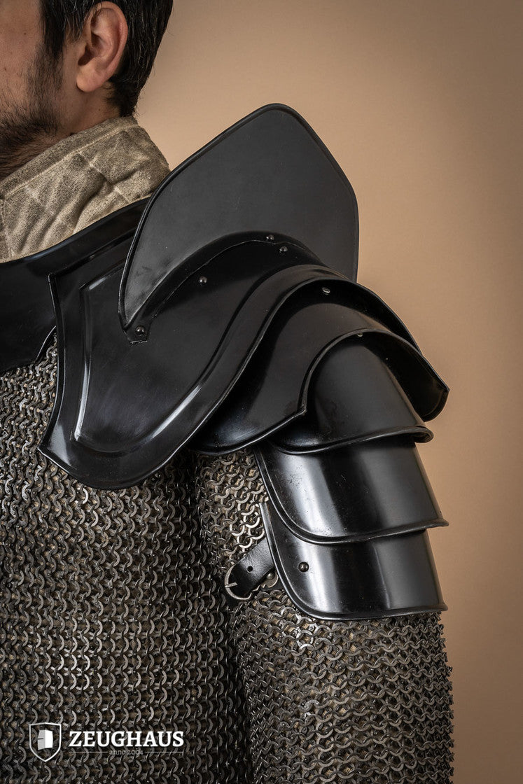 Burnished Warrior Pauldrons with Bladebreakers showcasing four-part upper arm plates and adjustable leather straps.