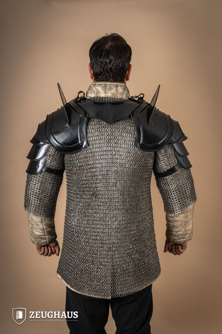 Burnished Warrior Pauldrons with Bladebreakers showcasing four-part upper arm plates and adjustable leather straps.