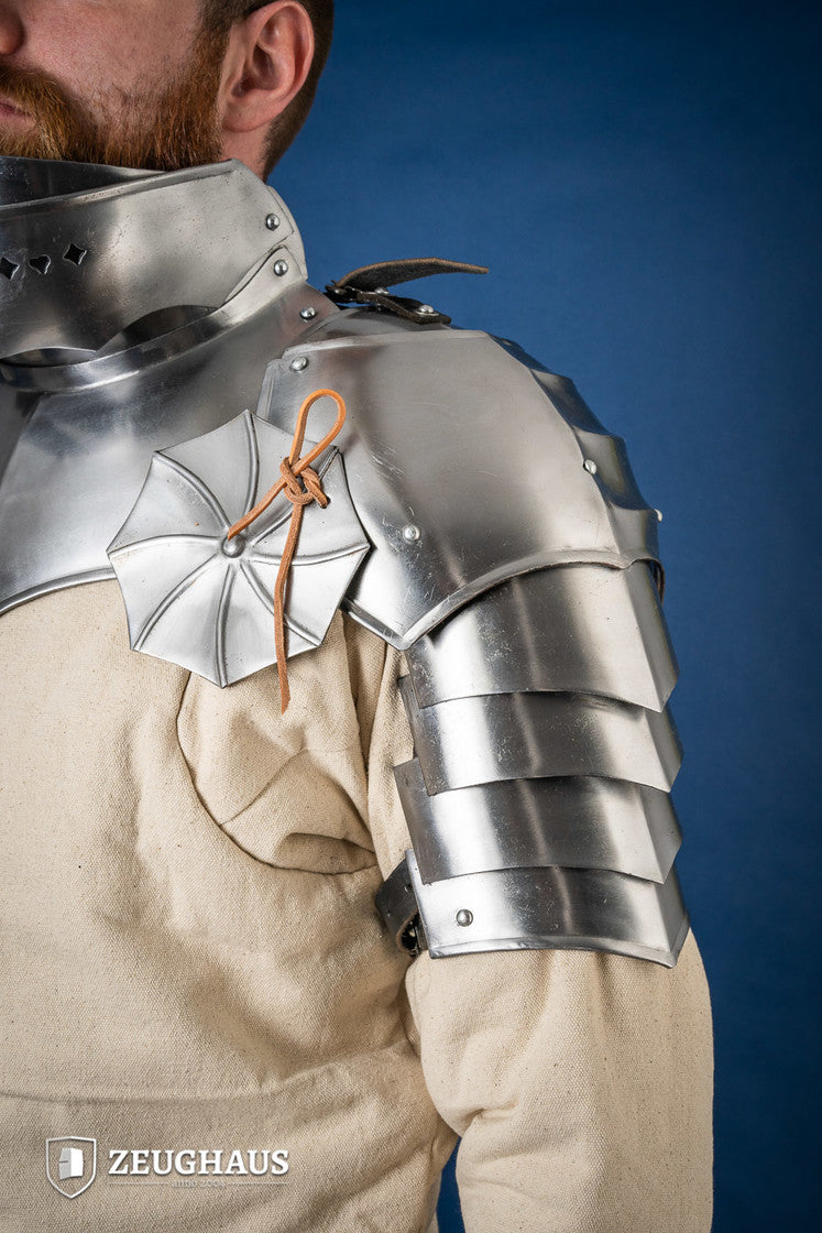 15th Century Pauldrons with Besagew, polished steel, featuring rosette-shaped hover discs and leather straps for secure fit.