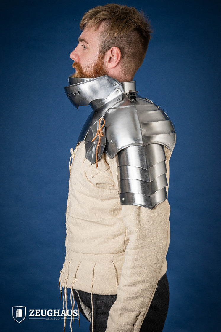 15th Century Pauldrons with Besagew, polished steel, featuring rosette-shaped hover discs and leather straps for secure fit.