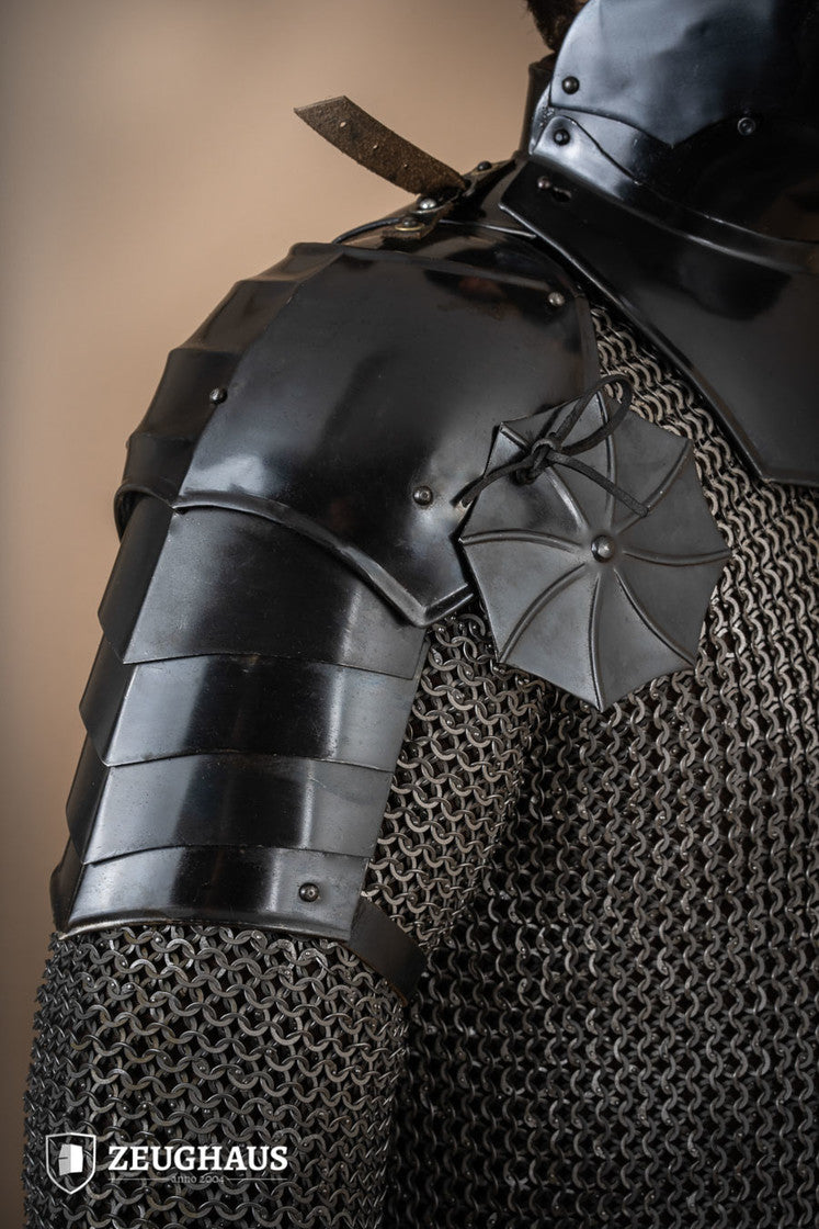 15th Century Pauldrons with Besagew, crafted from burnished steel with rosette-shaped hover discs for armpit protection.