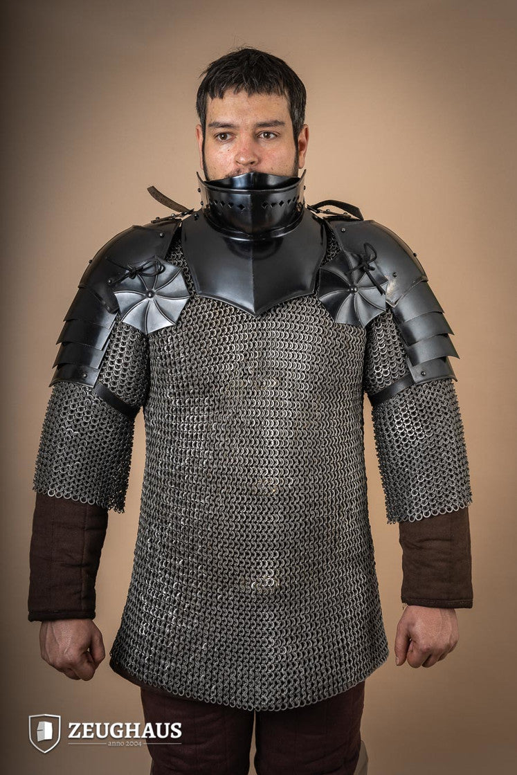 15th Century Pauldrons with Besagew, crafted from burnished steel with rosette-shaped hover discs for armpit protection.